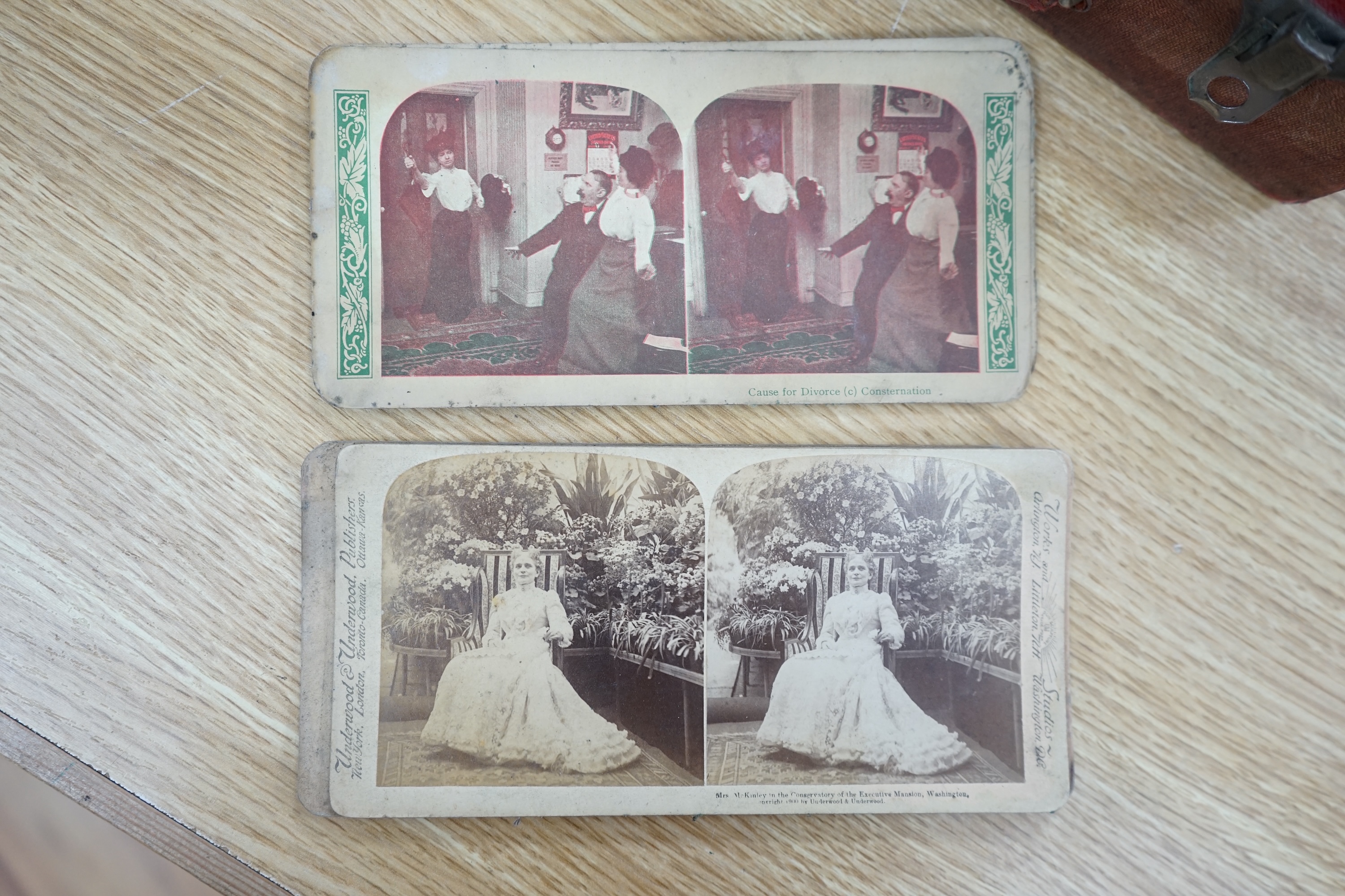 An R.K. White Co. stereoscopic viewer and a collection of slides, viewer 33cm long. Condition - cards have been damp at some point